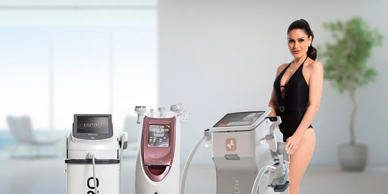 Modelo ao lado dos 3 melhores aparelhos de estetica corporal do mercado